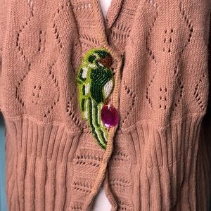 Storybook knots long parrot sweater